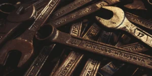 tools being cleaned of rust using an electrolysis tank